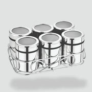 Stainless steel spice jars with transparent lids in wire rack organizer